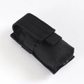 Black flashlight holder viewed from above and side
