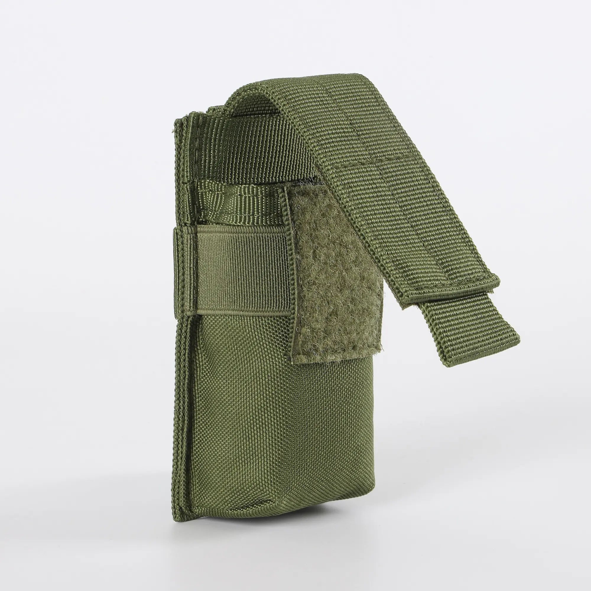 Green flashlight holder viewed from side with velcro open