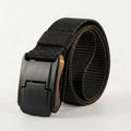 Black belt with a metallic buckle on a light gray background