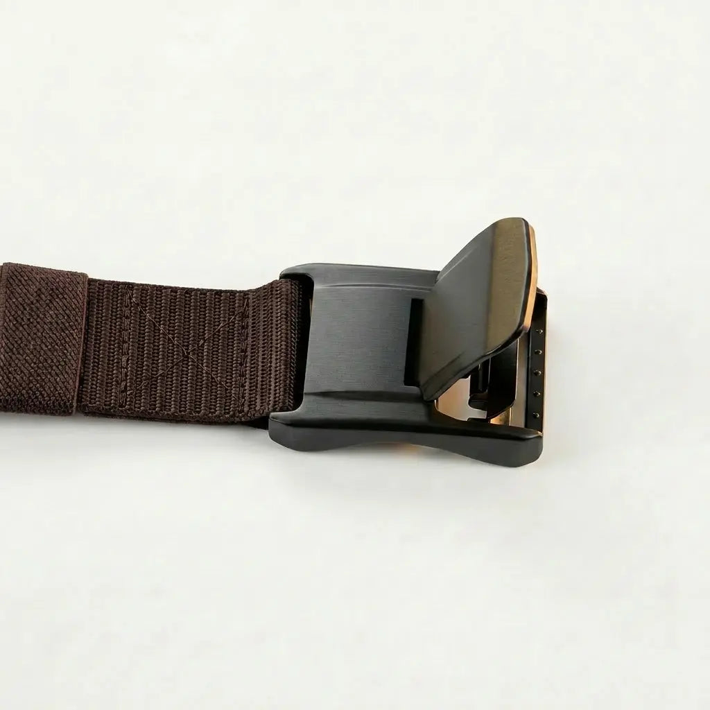 Dark brown belt with a metallic buckle on a light gray background