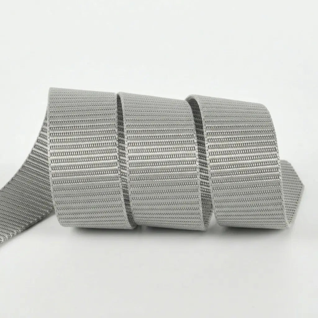 Gray webbing on a light gray background
