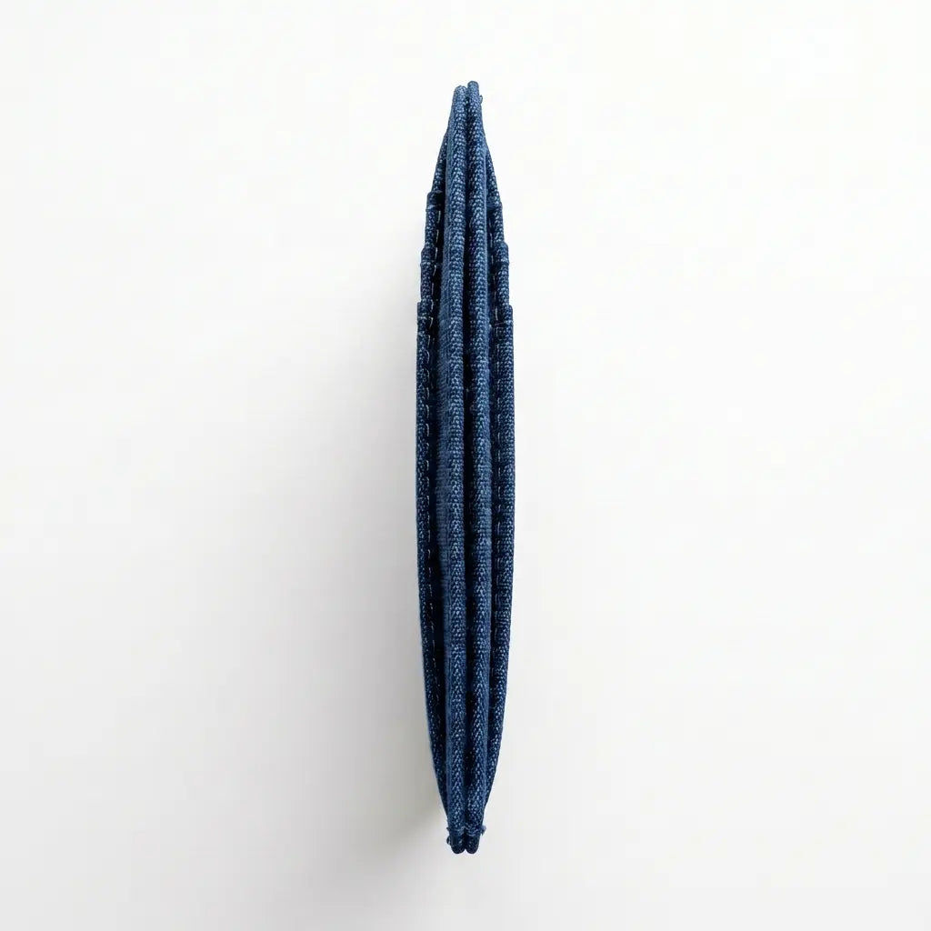 Blue wallet from side on a white background